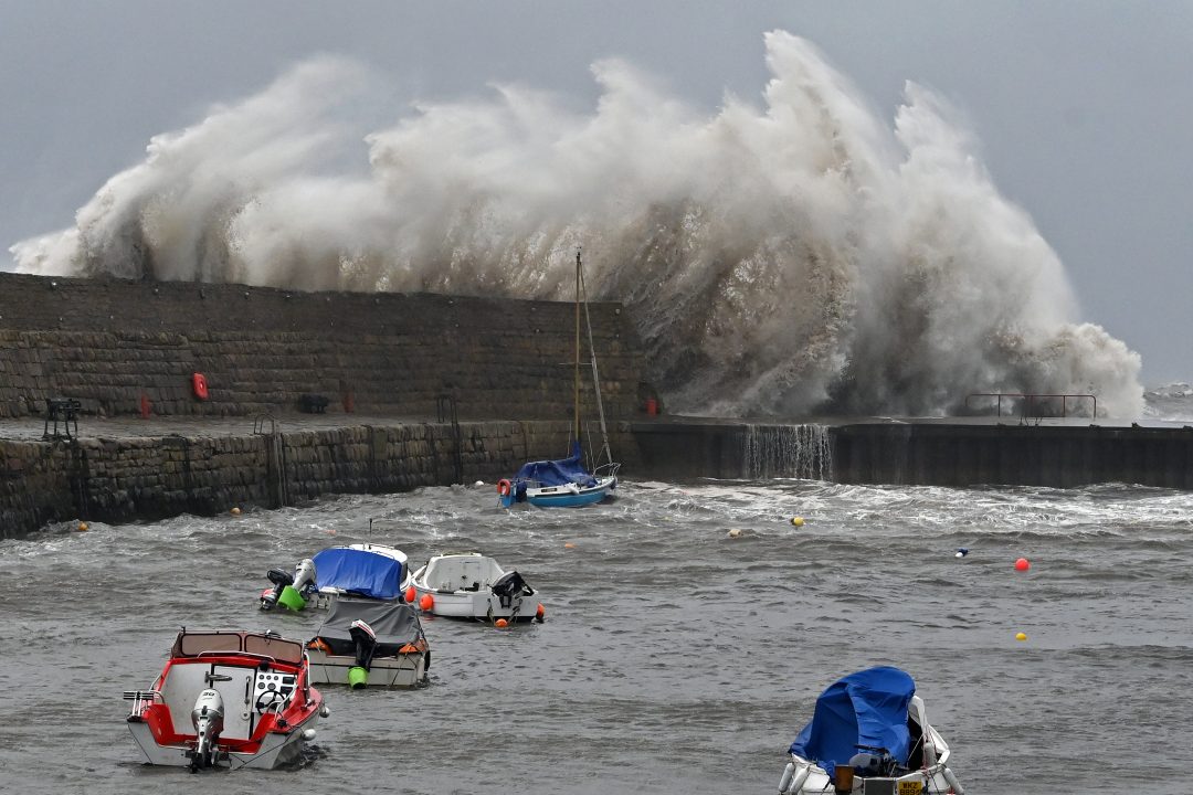 The second red "danger to life" weather warning in a week is issued in eastern areas of Scotland, with torrential precipitation and high winds predicted across the UK.