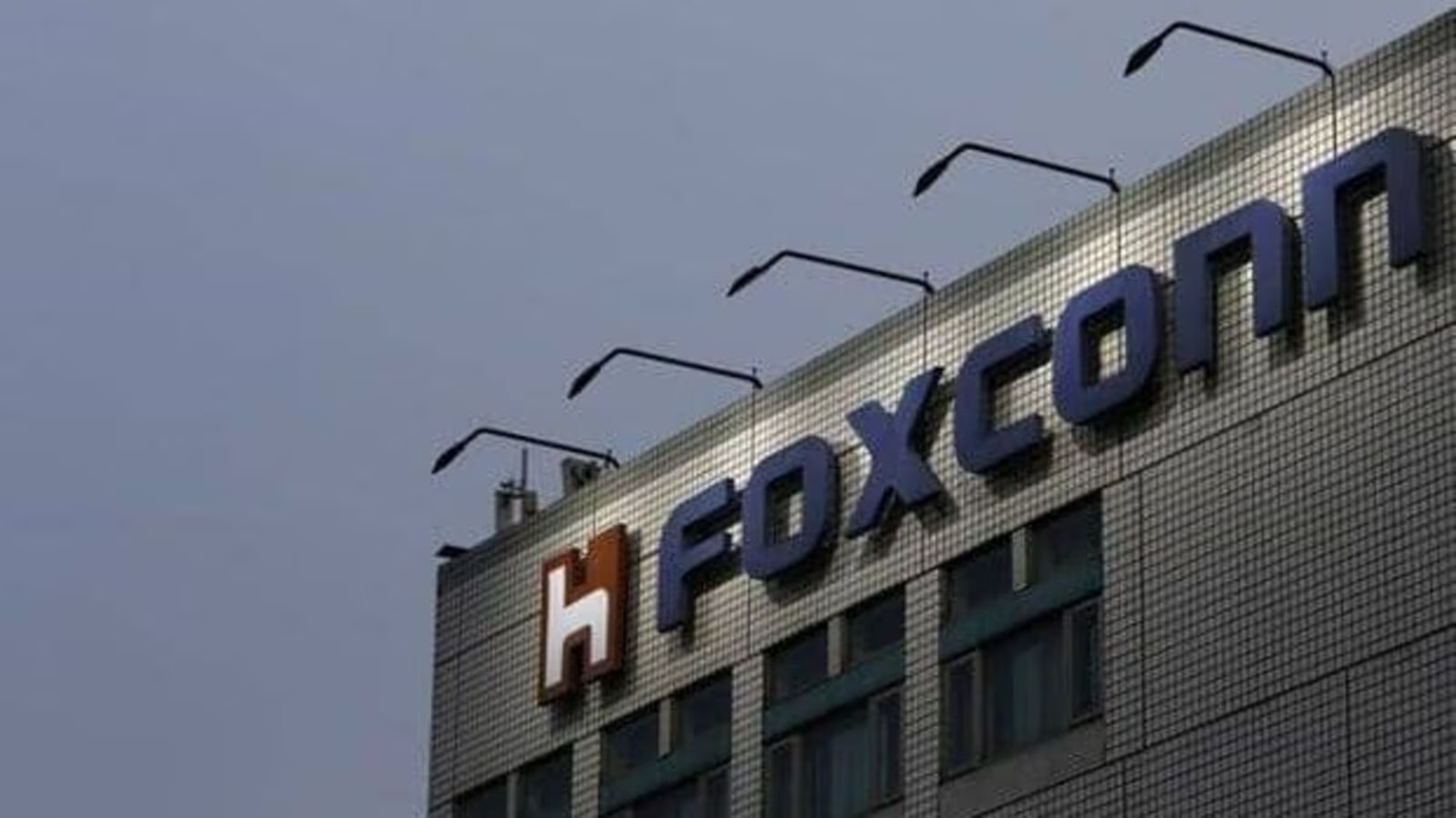 Chinese officials are looking into Taiwanese IT firm Foxconn over tax and land usage issues.