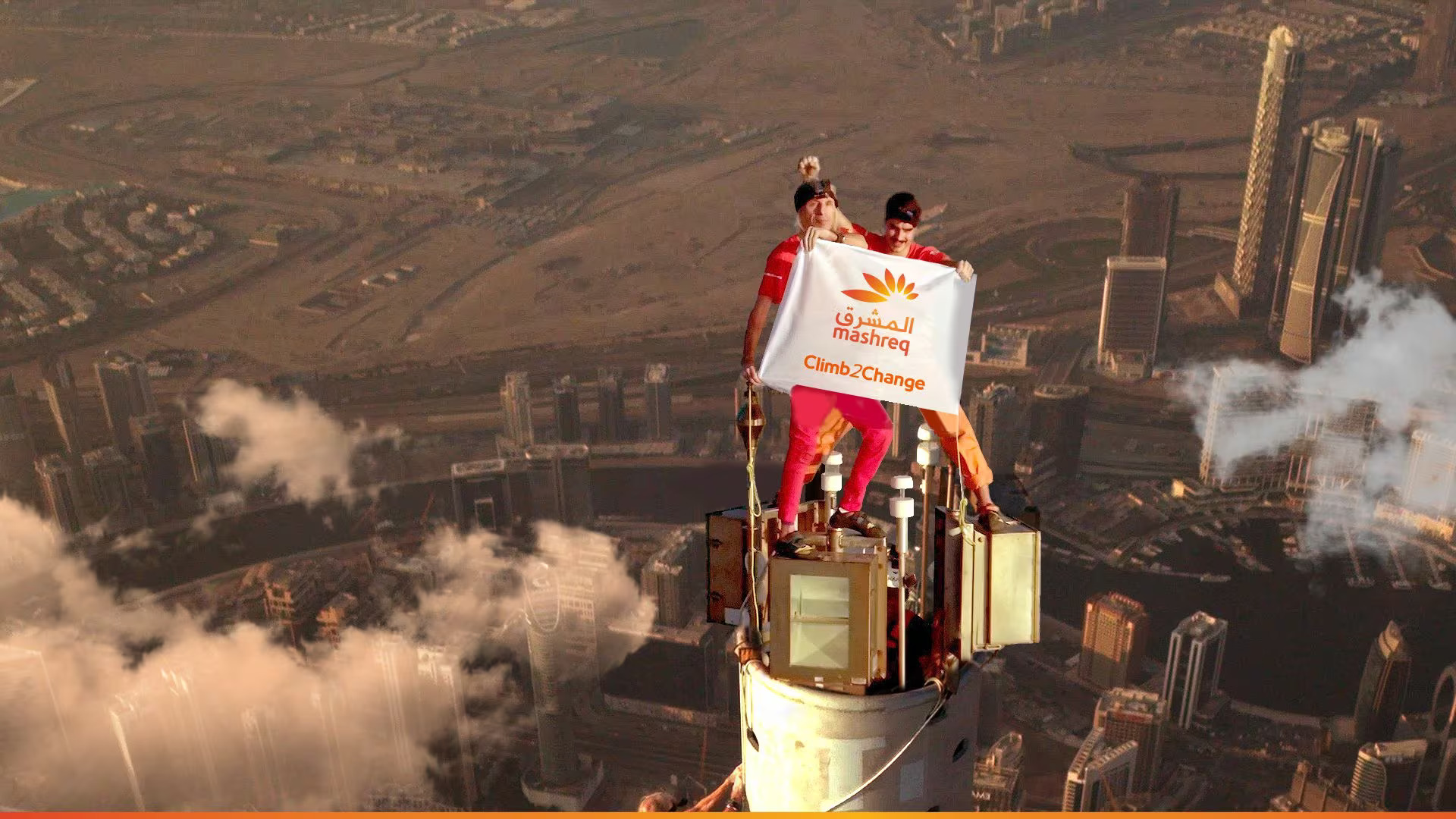 French Spiderman and associates take nine hours to reach the top of the planet's tallest building.