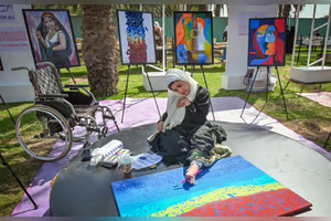 Emirati artist with cerebral palsy